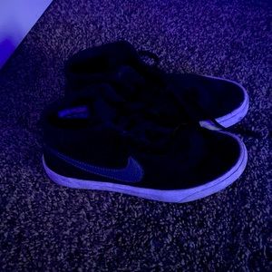 Black mid Nike shoes